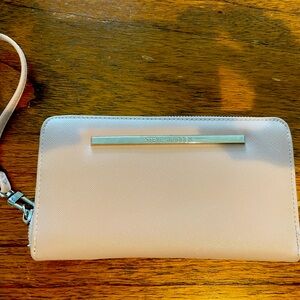 Steve madden zip wallet.